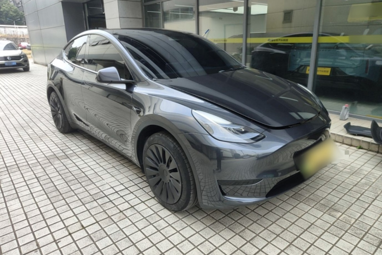 Tesla Model Y 2024 #4 Tesla Model Y 2024 car image #4