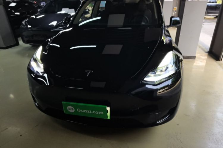 Tesla Model Y 2024 #3 Tesla Model Y 2024 car image #3