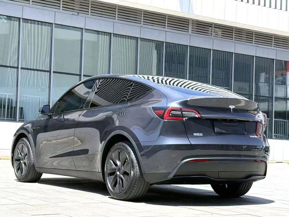 Tesla Model Y 2024 #5 Tesla Model Y 2024 car image #5