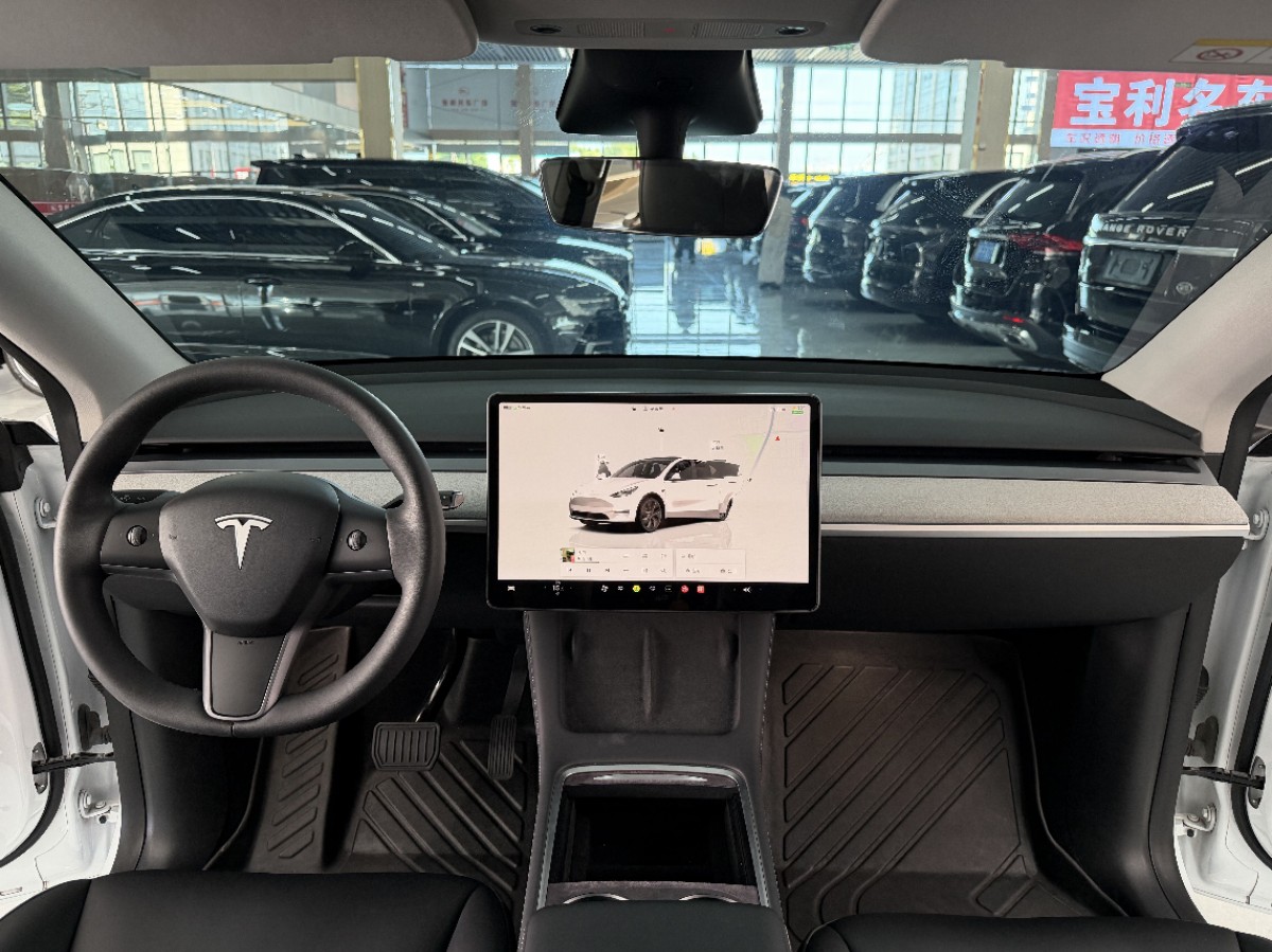 Tesla Model Y 2024 #6 Tesla Model Y 2024 car image #6
