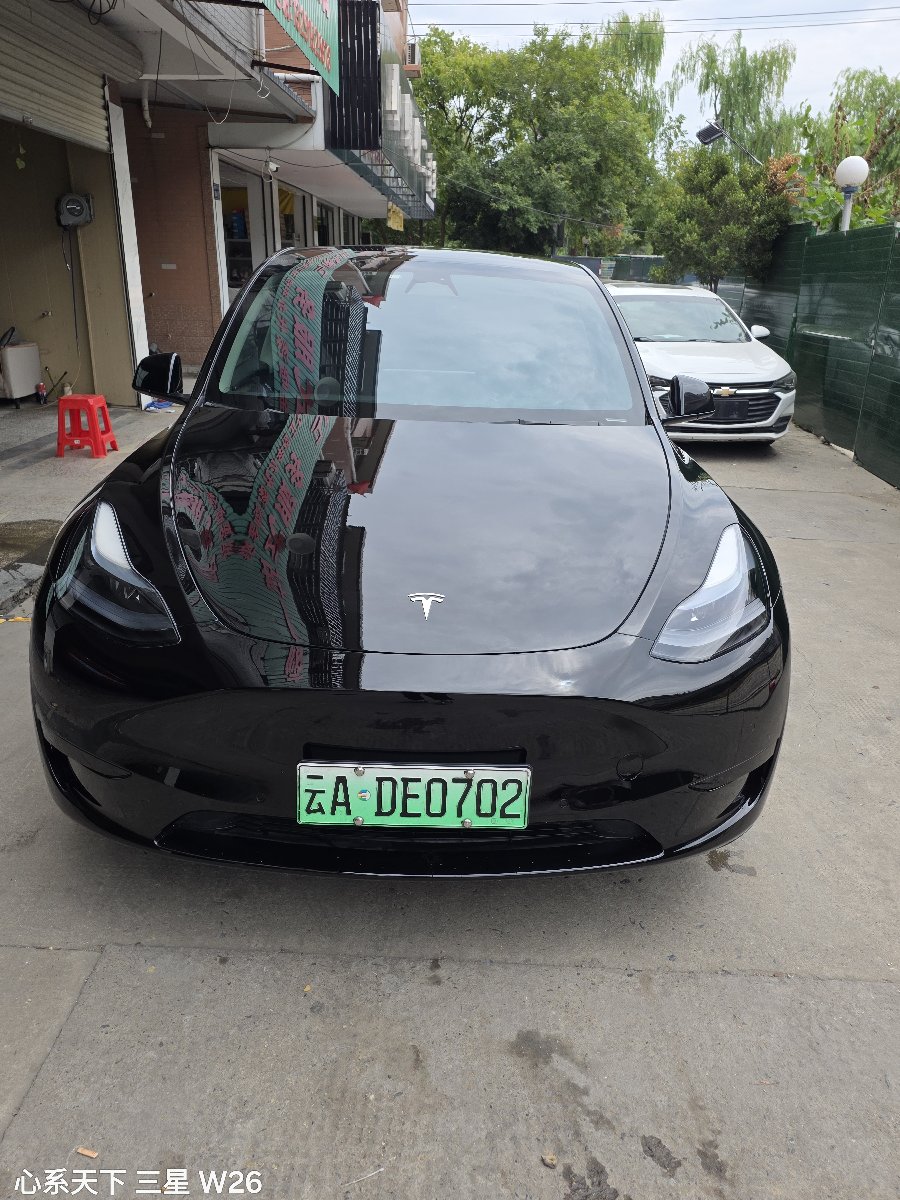 Tesla Model Y 2023 #2 Tesla Model Y 2023 car image #2