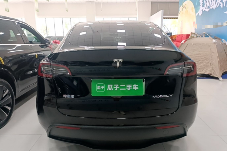 Tesla Model Y 2024 #4 Tesla Model Y 2024 car image #4