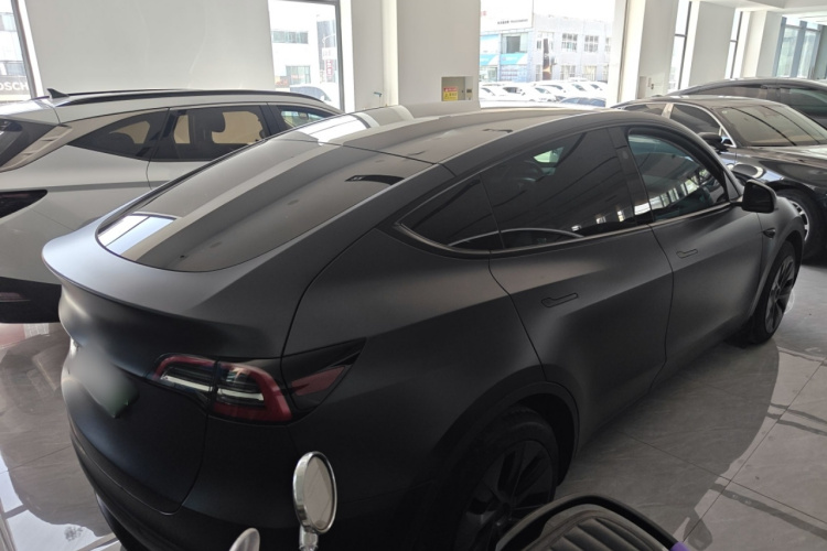 Tesla Model Y 2024 #7 Tesla Model Y 2024 car image #7