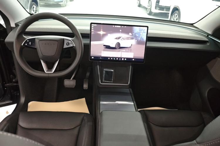 Tesla Model Y 2025 #10 Tesla Model Y 2025 car image #10