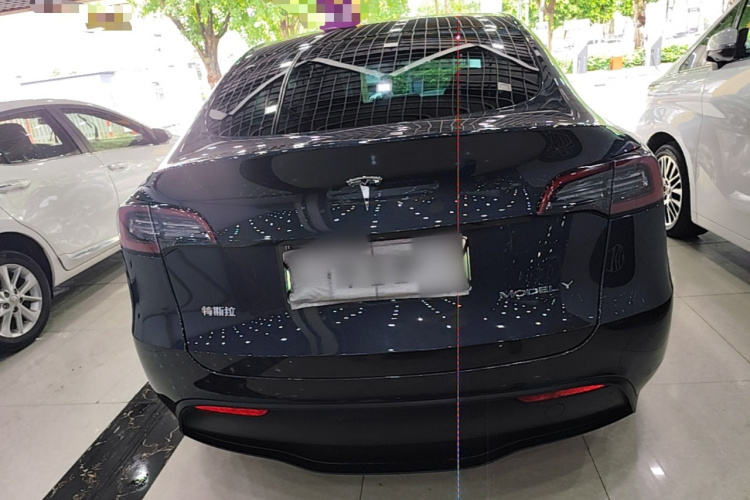 Tesla Model Y 2024 #6 Tesla Model Y 2024 car image #6