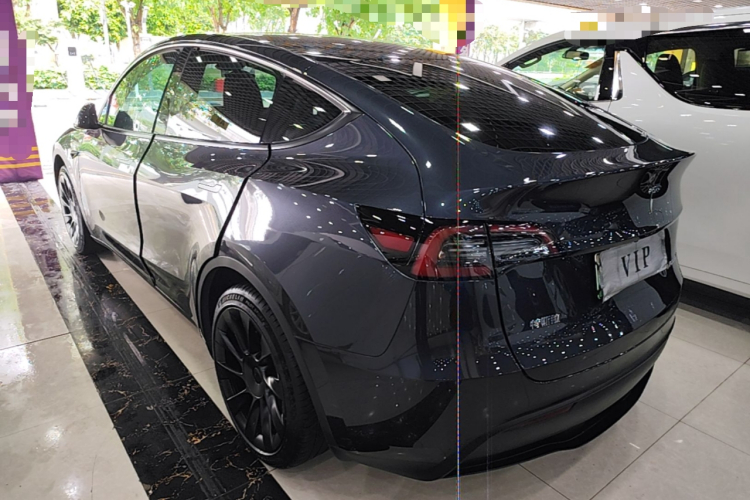 Tesla Model Y 2024 #5 Tesla Model Y 2024 car image #5