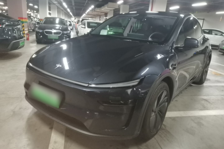 Tesla Model Y 2025 #2 Tesla Model Y 2025 car image #2