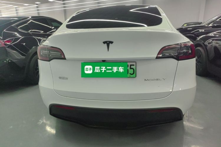 Tesla Model Y 2024 #6 Tesla Model Y 2024 car image #6