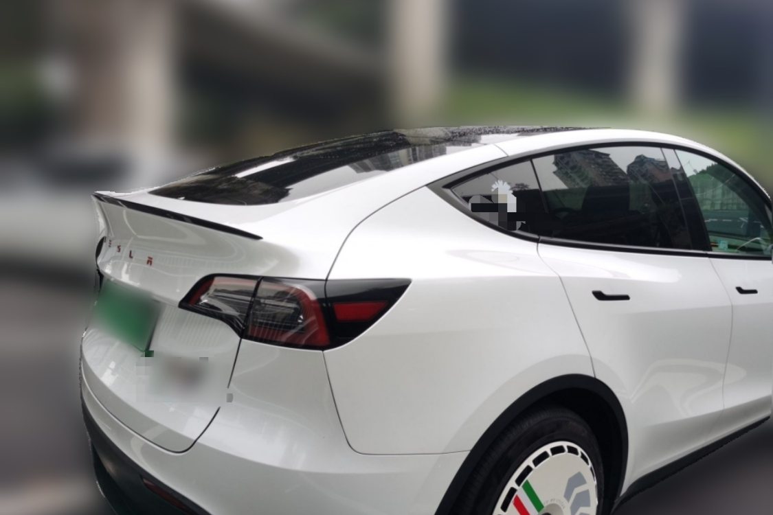 Tesla Model Y 2024 #4 Tesla Model Y 2024 car image #4