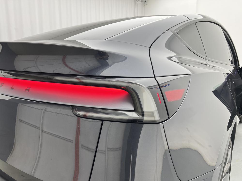 Tesla Model Y 2025 #8 Tesla Model Y 2025 car image #8