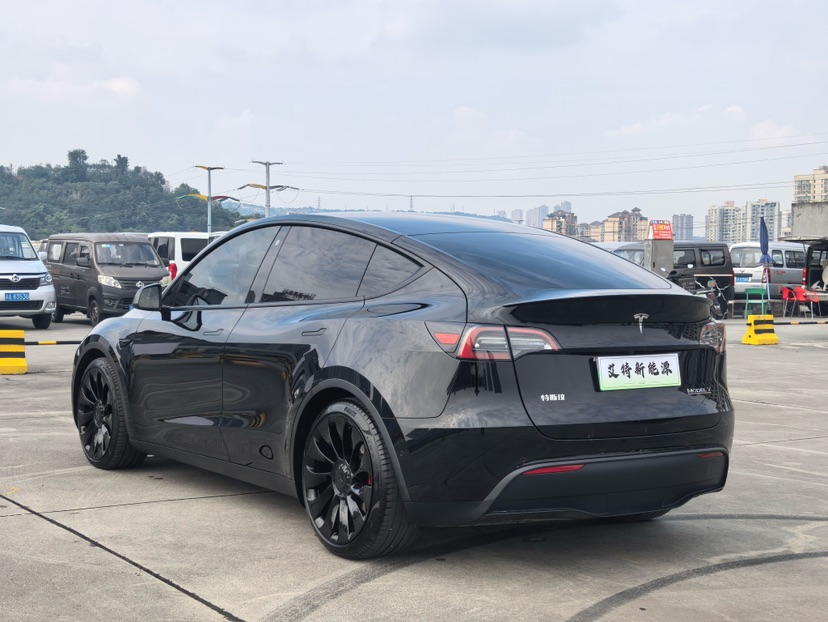 Tesla Model Y 2023 #5 Tesla Model Y 2023 изображение автомобиля #5