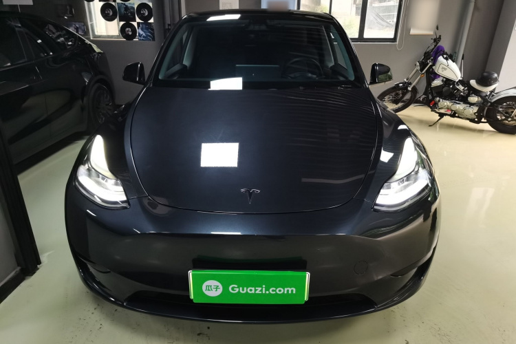 Tesla Model Y 2024 #3 Tesla Model Y 2024 car image #3