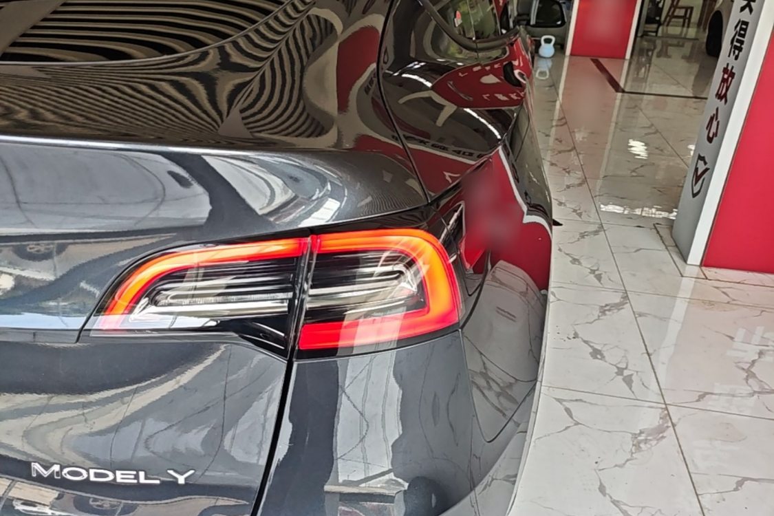 Tesla Model Y 2024 #7 Tesla Model Y 2024 car image #7