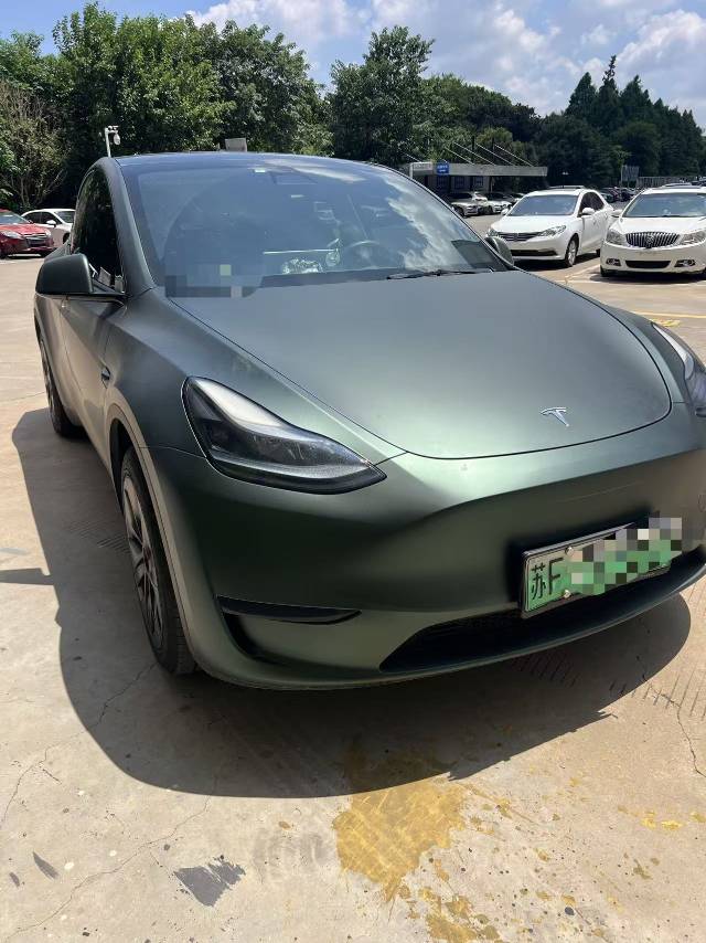 Tesla Model Y 2024 #2 Tesla Model Y 2024 car image #2