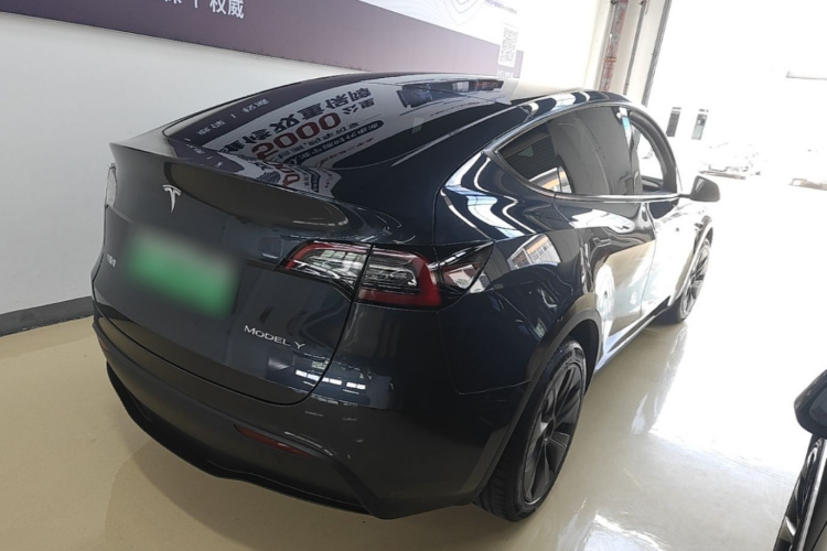 Tesla Model Y 2024 #7 Tesla Model Y 2024 car image #7
