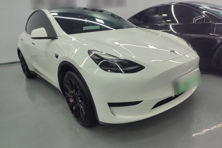 Tesla Model Y 2024 #4 Tesla Model Y 2024 car image #4