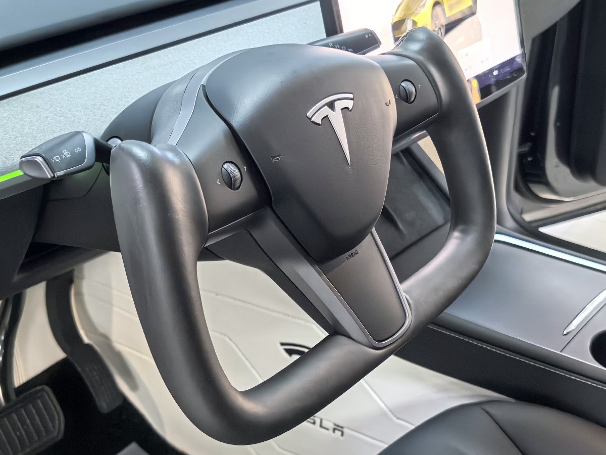 Tesla Model Y 2024 #7 Tesla Model Y 2024 car image #7
