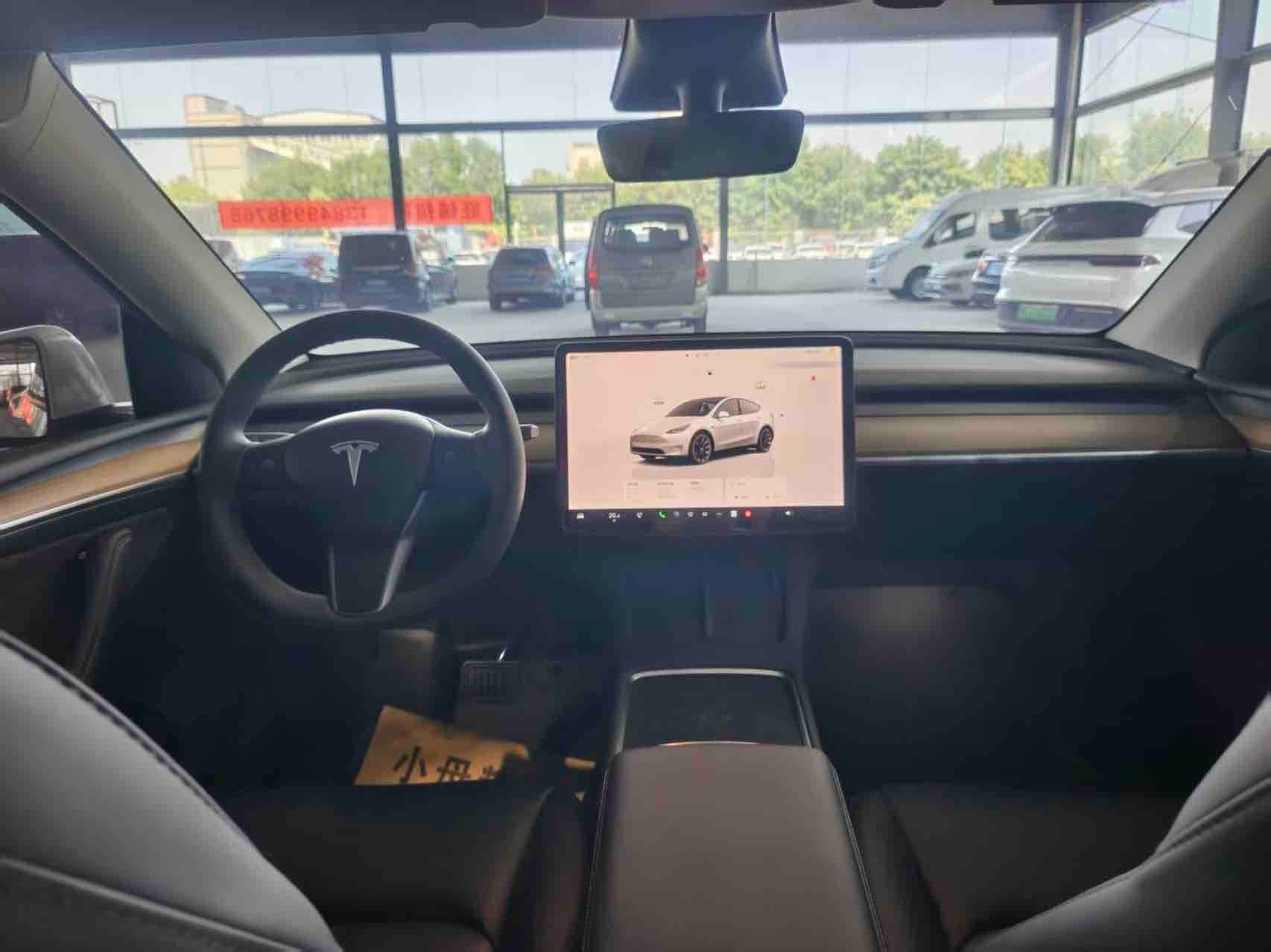 Tesla Model Y 2023 #6 Tesla Model Y 2023 car image #6