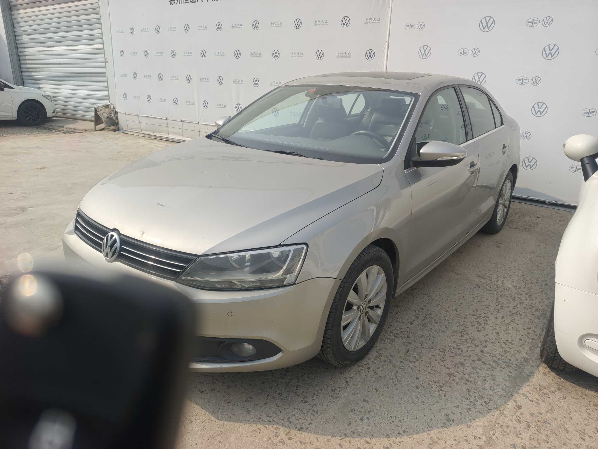 Volkswagen Sagitar 2014 صورة سيارة 