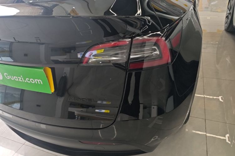 Tesla Model Y 2024 #8 Tesla Model Y 2024 car image #8