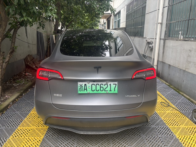 Tesla Model Y 2024 #6 Tesla Model Y 2024 car image #6