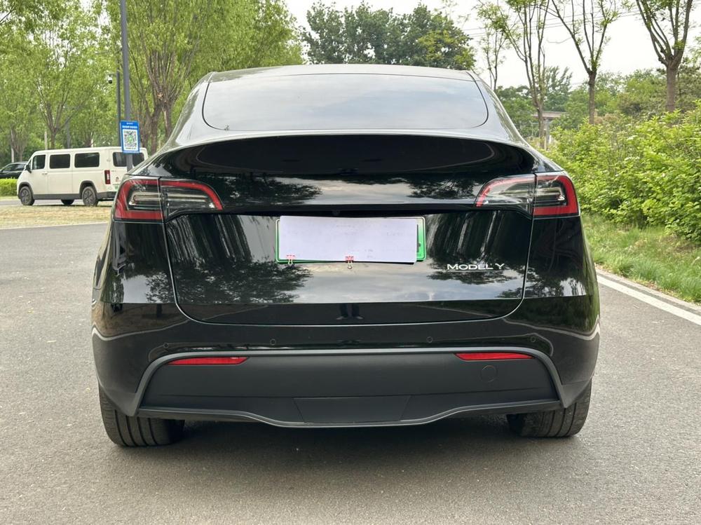 Tesla Model Y 2023 #5 Tesla Model Y 2023 car image #5