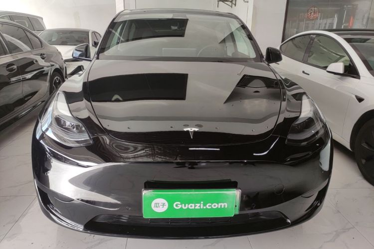 Tesla Model Y 2024 #3 Tesla Model Y 2024 car image #3