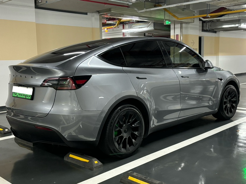 Tesla Model Y 2024 #7 Tesla Model Y 2024 car image #7