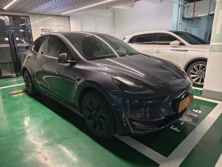 Tesla Model Y 2024 #6 Tesla Model Y 2024 car image #6