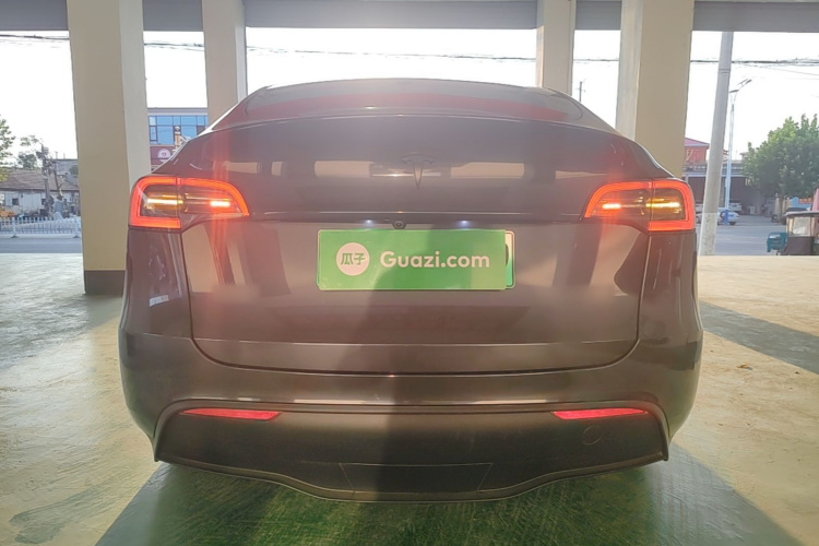 Tesla Model Y 2024 #6 Tesla Model Y 2024 car image #6