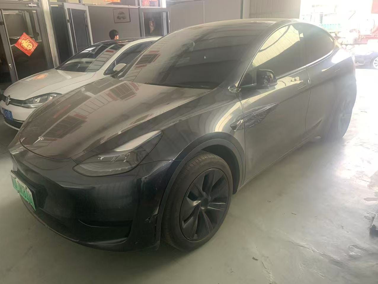 Tesla Model Y 2024 #2 Tesla Model Y 2024 car image #2