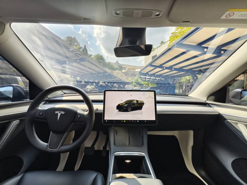 Tesla Model Y 2024 #6 Tesla Model Y 2024 car image #6