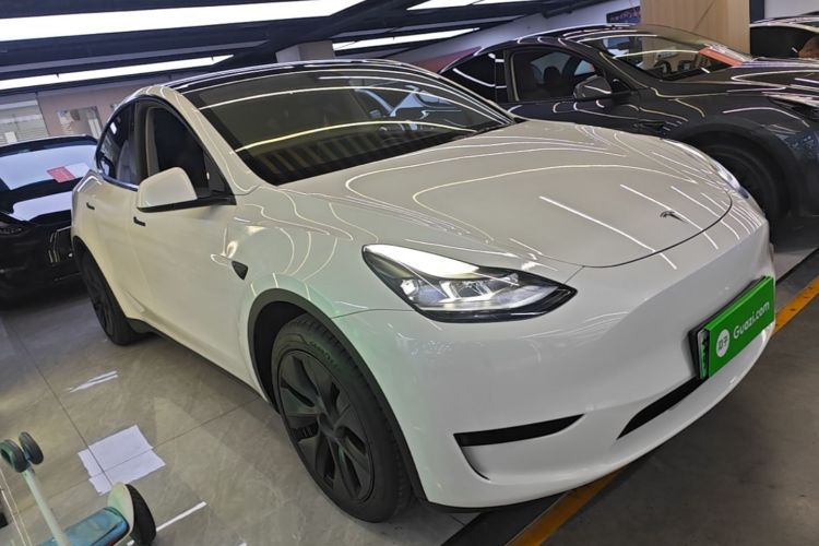 Tesla Model Y 2024 #4 Tesla Model Y 2024 car image #4