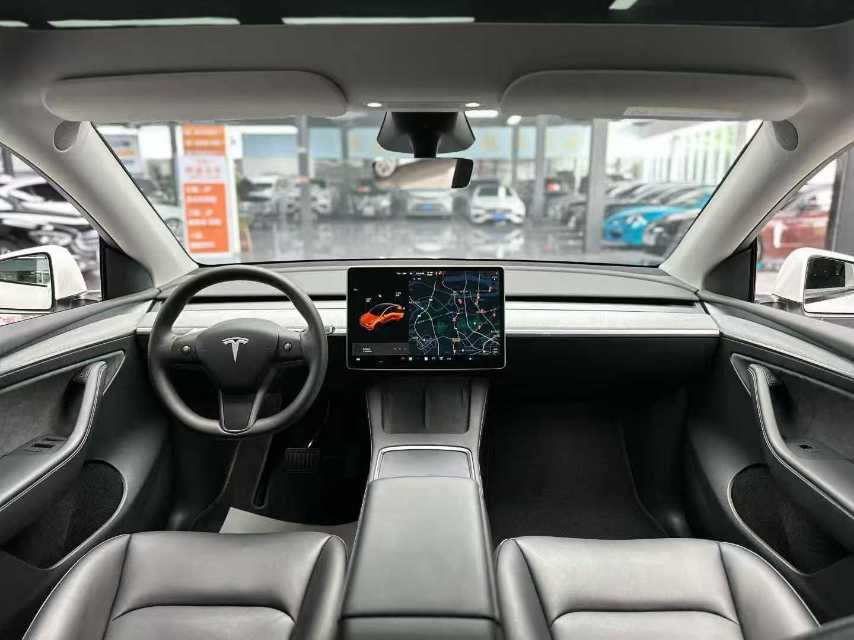 Tesla Model Y 2024 #4 Tesla Model Y 2024 car image #4