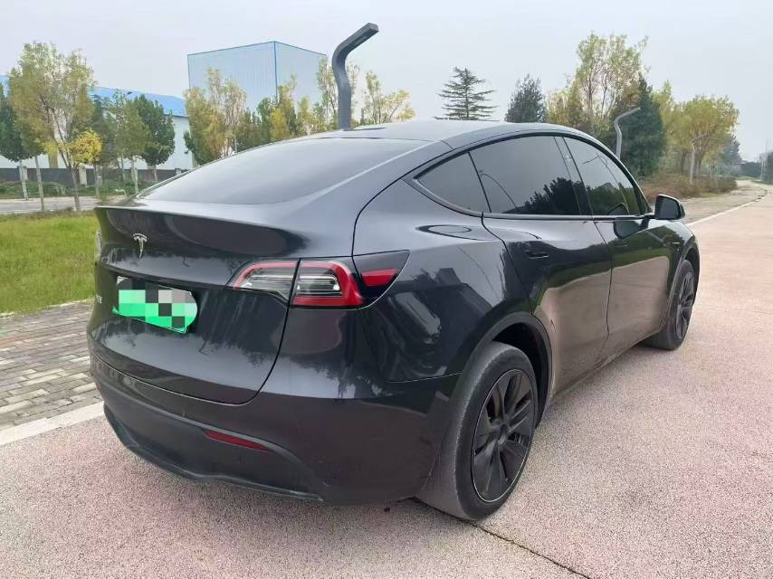 Tesla Model Y 2024 #5 Tesla Model Y 2024 car image #5