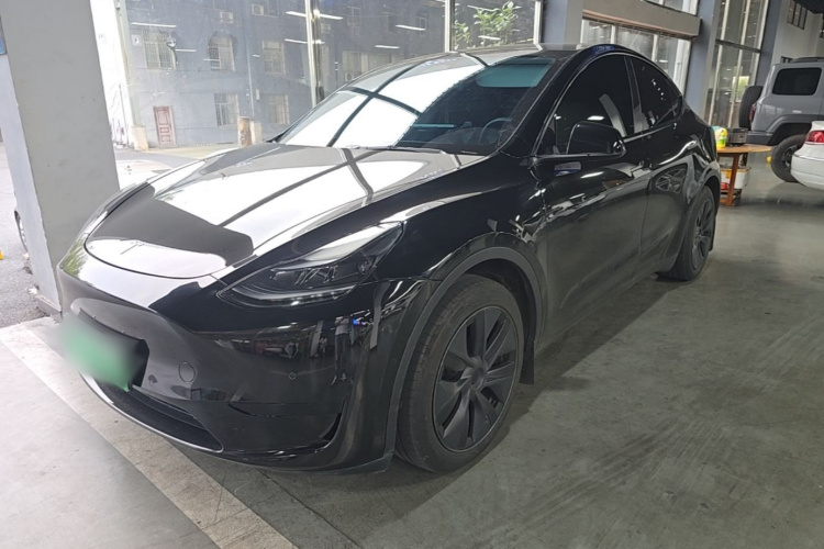 Tesla Model Y 2024 #2 Tesla Model Y 2024 car image #2
