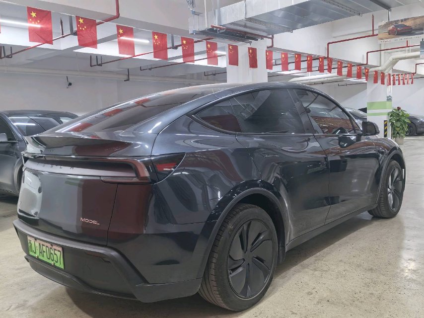 Tesla Model Y 2025 #9 Tesla Model Y 2025 car image #9