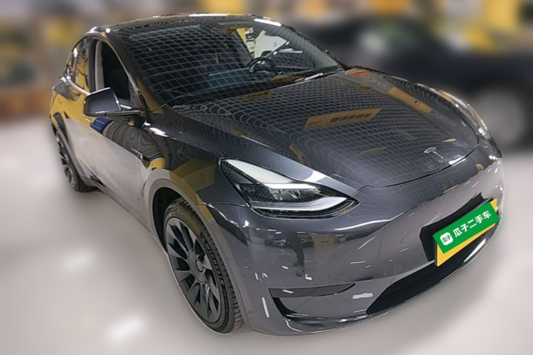 Tesla Model Y 2024 #4 Tesla Model Y 2024 car image #4