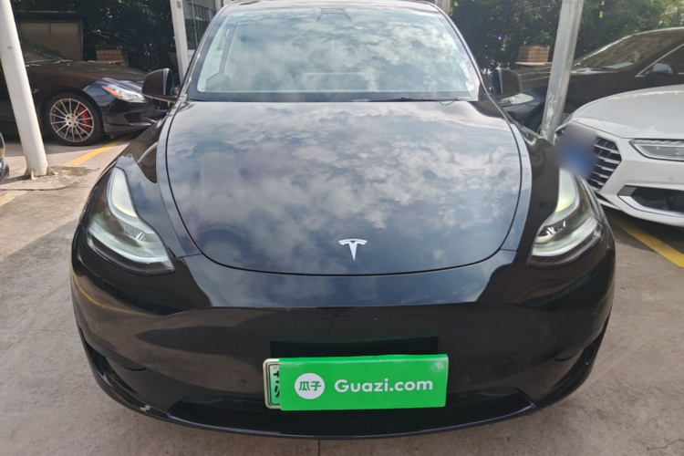 Tesla Model Y 2024 #3 Tesla Model Y 2024 car image #3