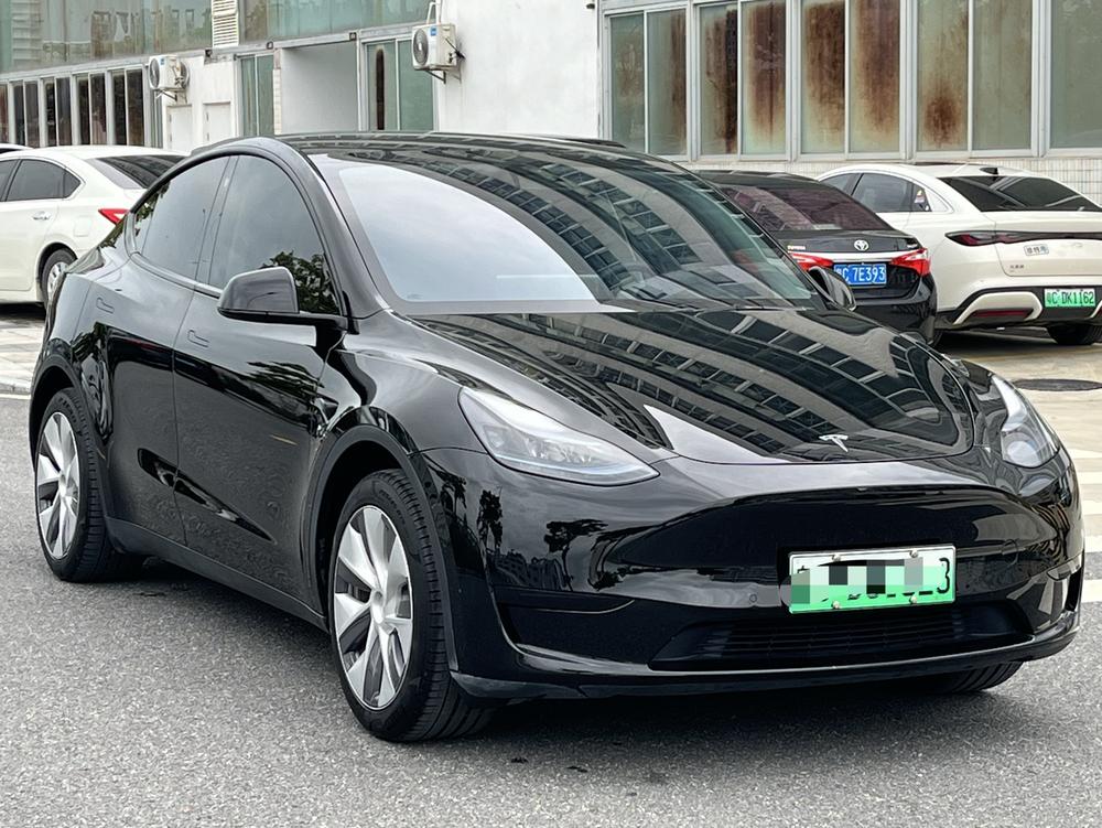 Tesla Model Y 2023 #3 Tesla Model Y 2023 car image #3