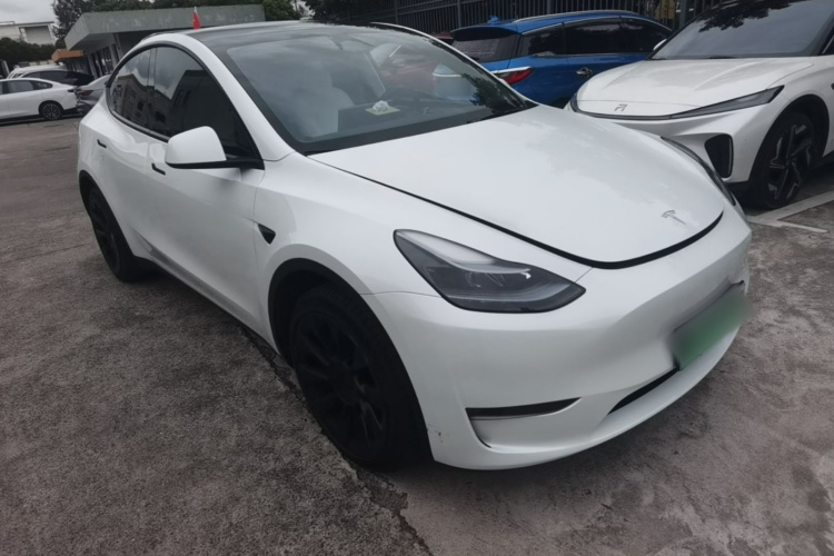 Tesla Model Y 2024 #4 Tesla Model Y 2024 car image #4