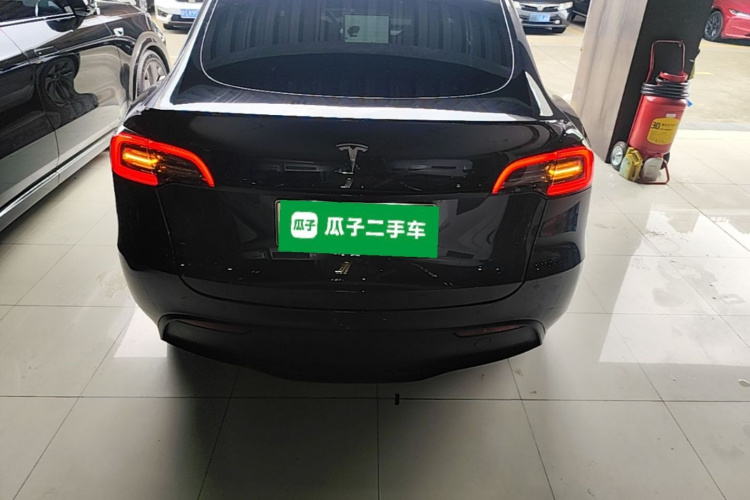 Tesla Model Y 2024 #6 Tesla Model Y 2024 immagine di auto #6