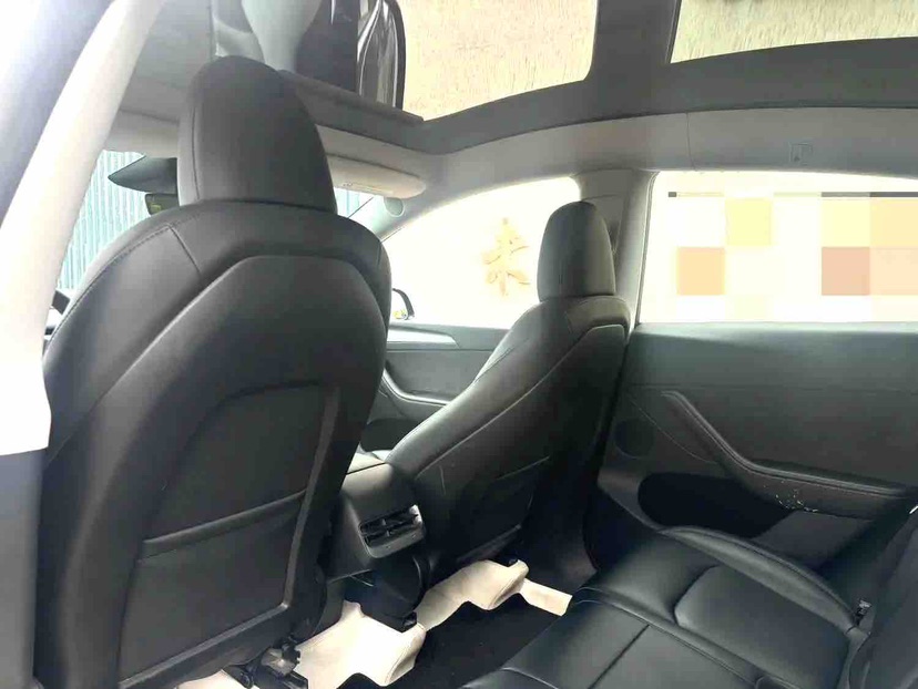 Tesla Model Y 2024 #4 Tesla Model Y 2024 car image #4