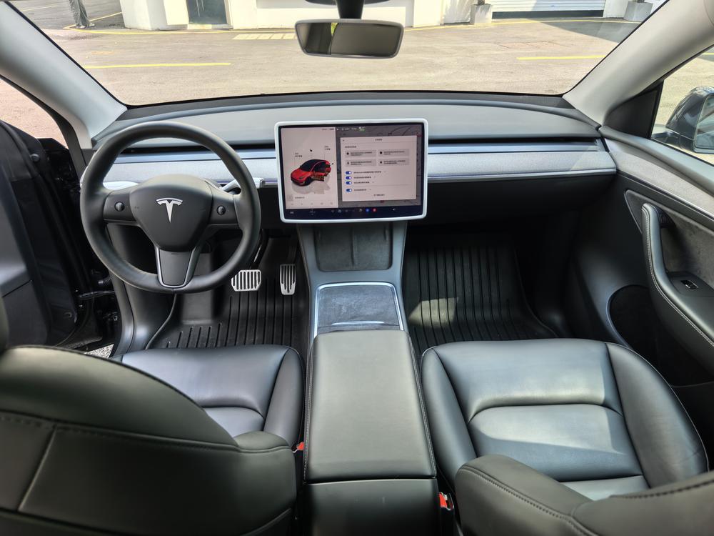 Tesla Model Y 2024 #7 Tesla Model Y 2024 car image #7