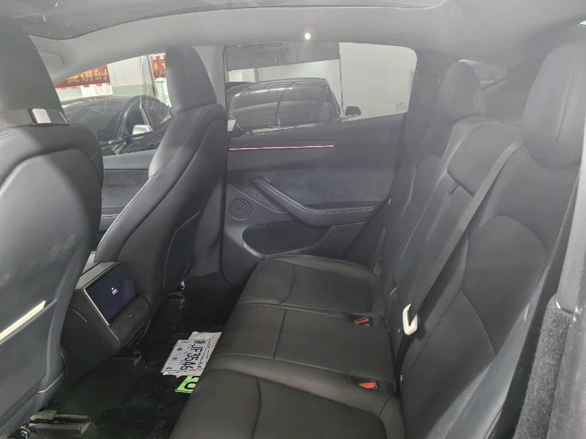 Tesla Model Y 2025 #6 Tesla Model Y 2025 car image #6