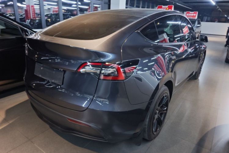 Tesla Model Y 2024 #7 Tesla Model Y 2024 car image #7