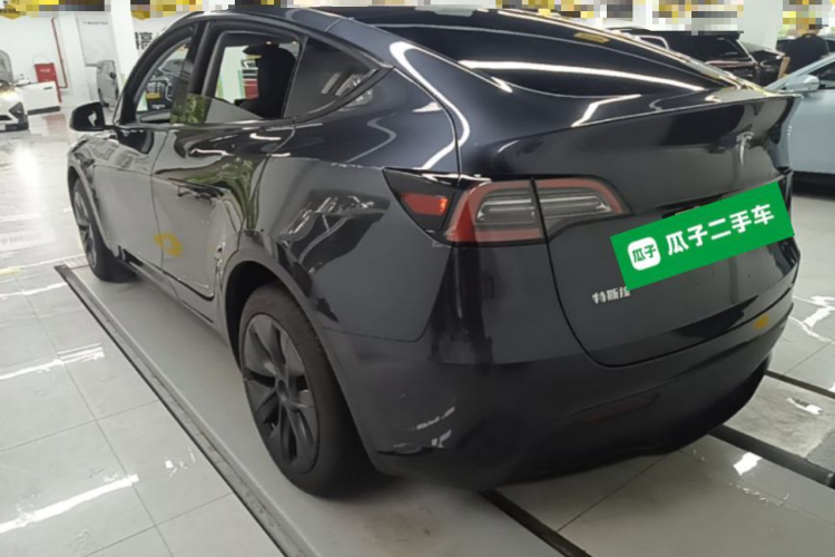 Tesla Model Y 2024 #7 Tesla Model Y 2024 car image #7