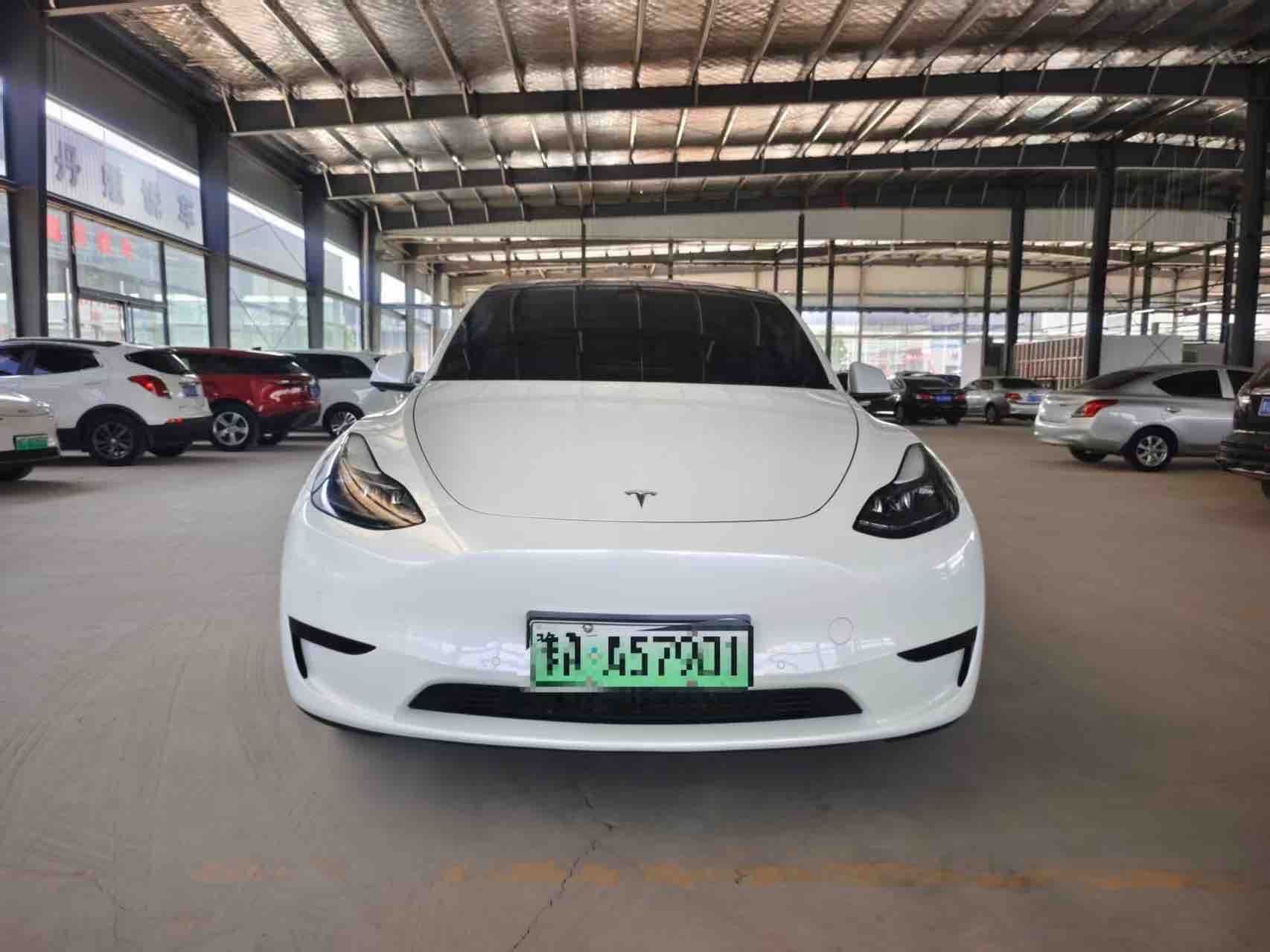Tesla Model Y 2023 #2 Tesla Model Y 2023 car image #2