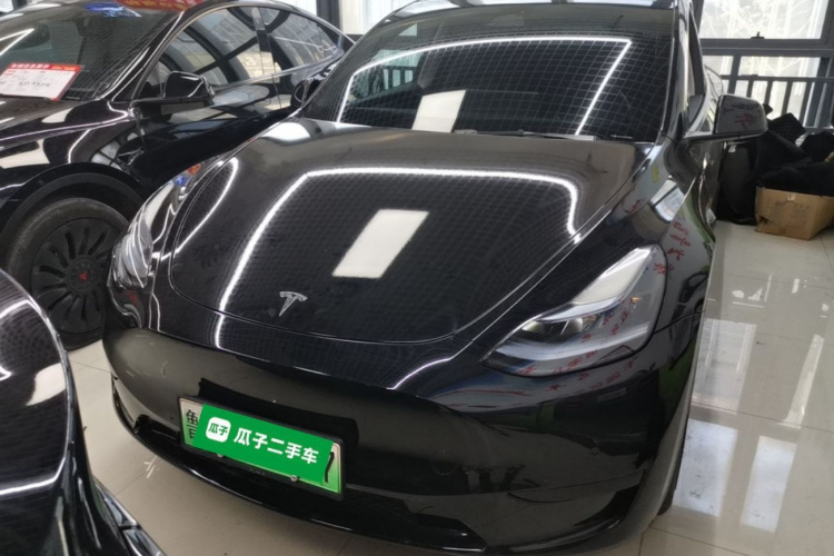 Tesla Model Y 2024 #3 Tesla Model Y 2024 car image #3