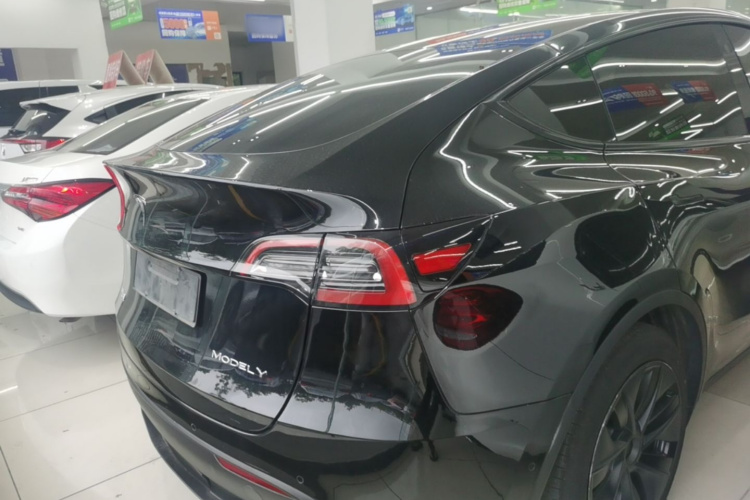 Tesla Model Y 2024 #7 Tesla Model Y 2024 car image #7
